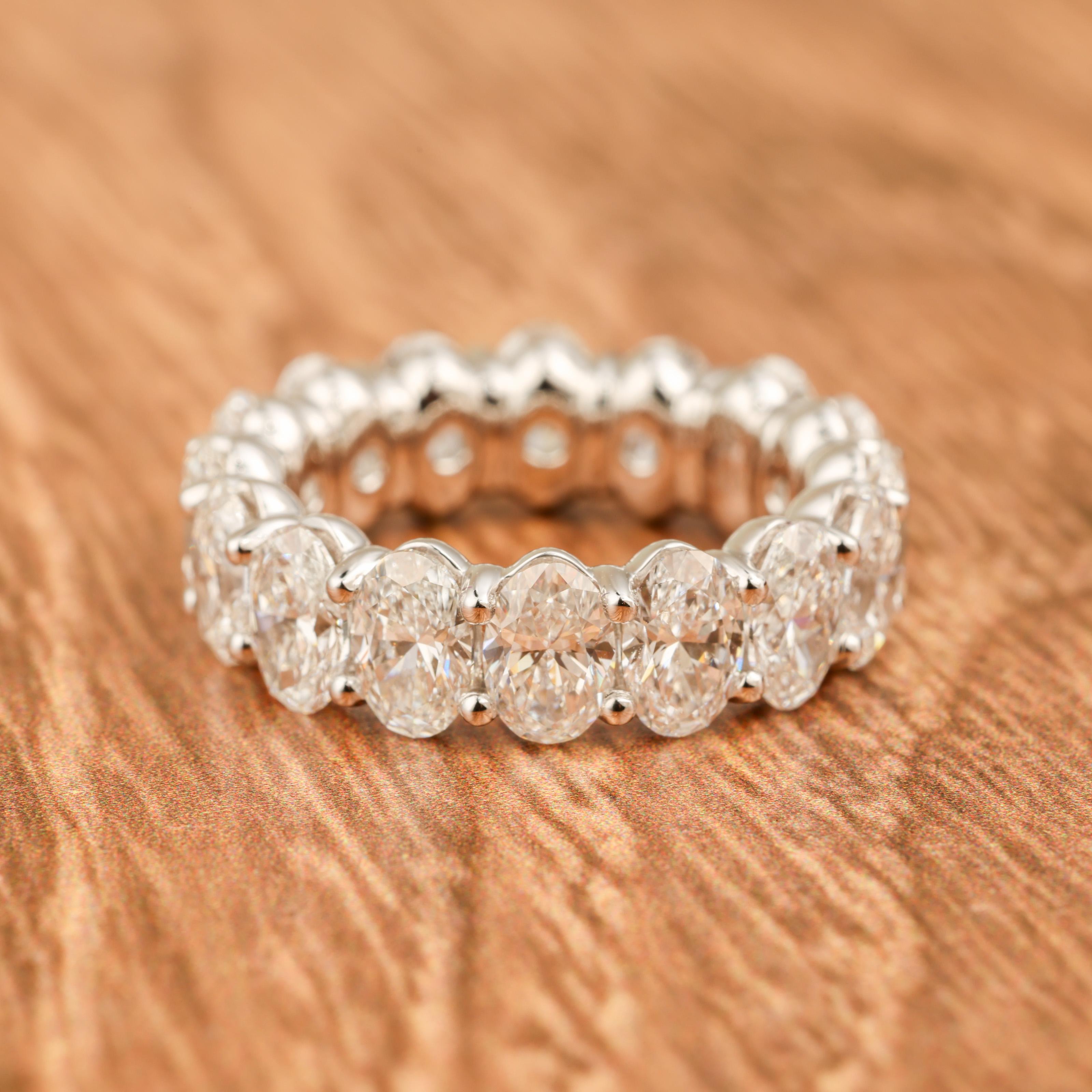 Platinum Band Ring with 6.0 Carat Oval-Cut White Diamonds