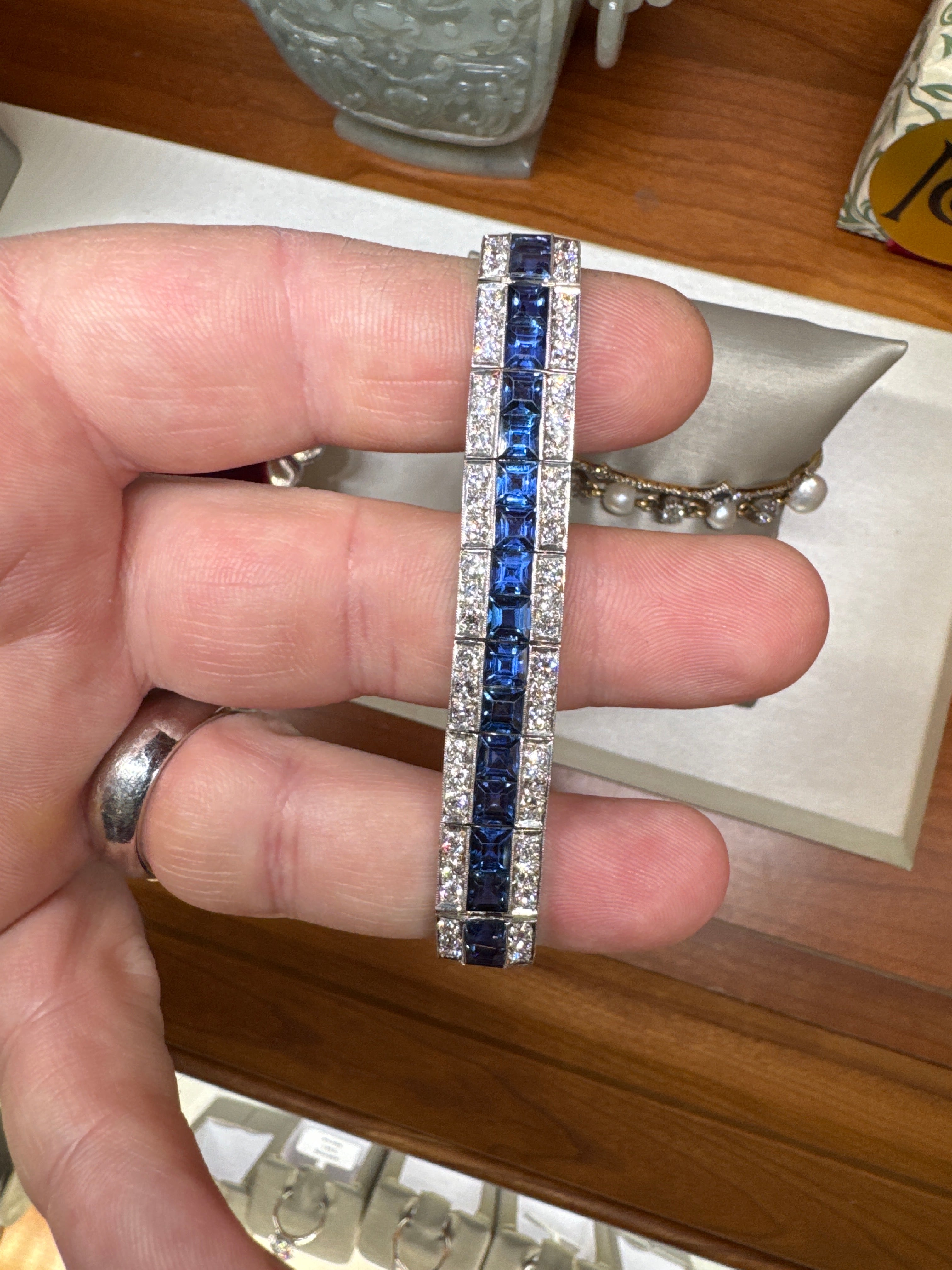 Platinum Art Deco Yogo Gulch Sapphire (22ct) & Diamond (9cttw) three row line bracelet AGL certified.
