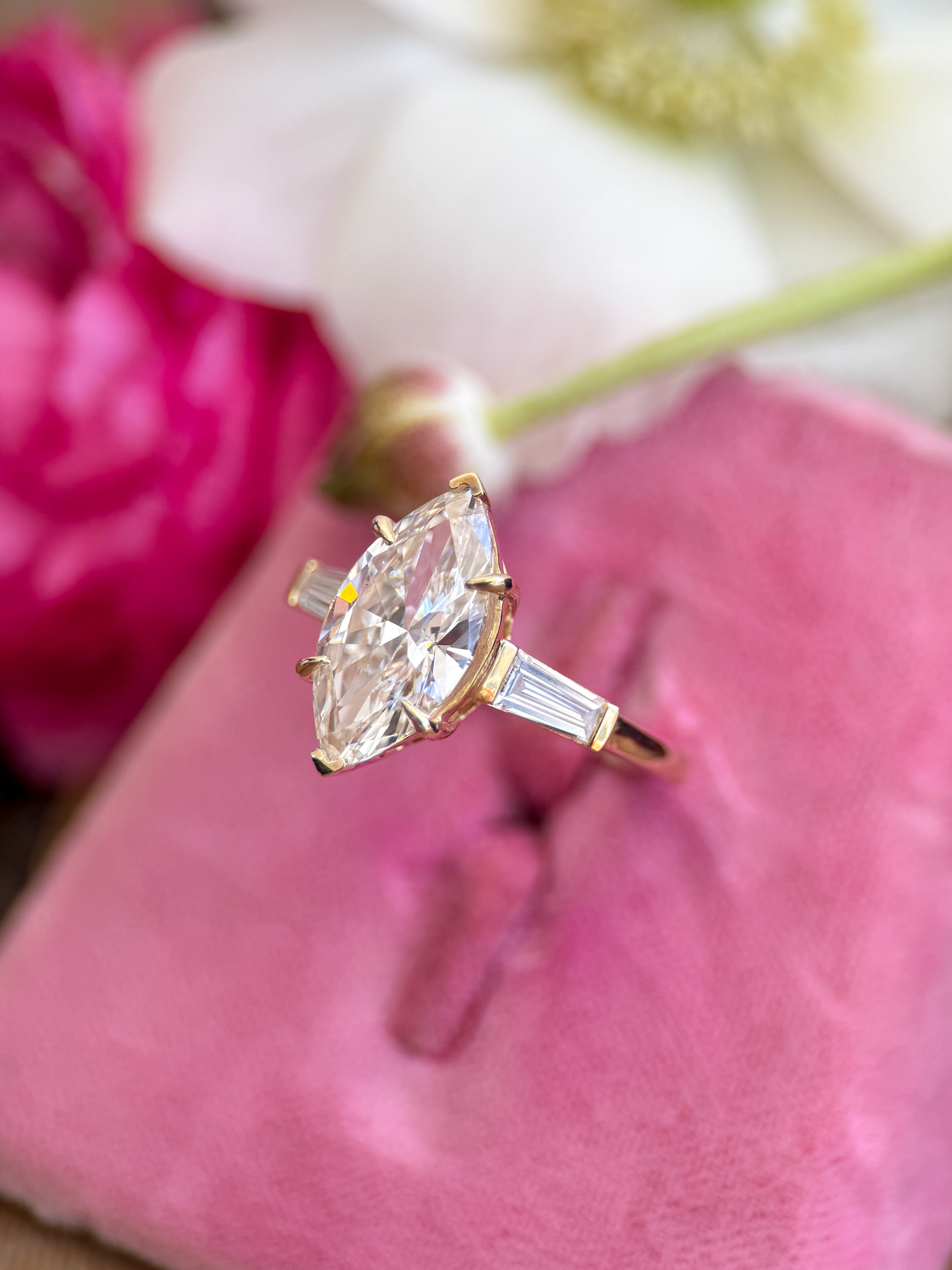 M & Co. Marquise Engagement Ring with Tapered Baguettes