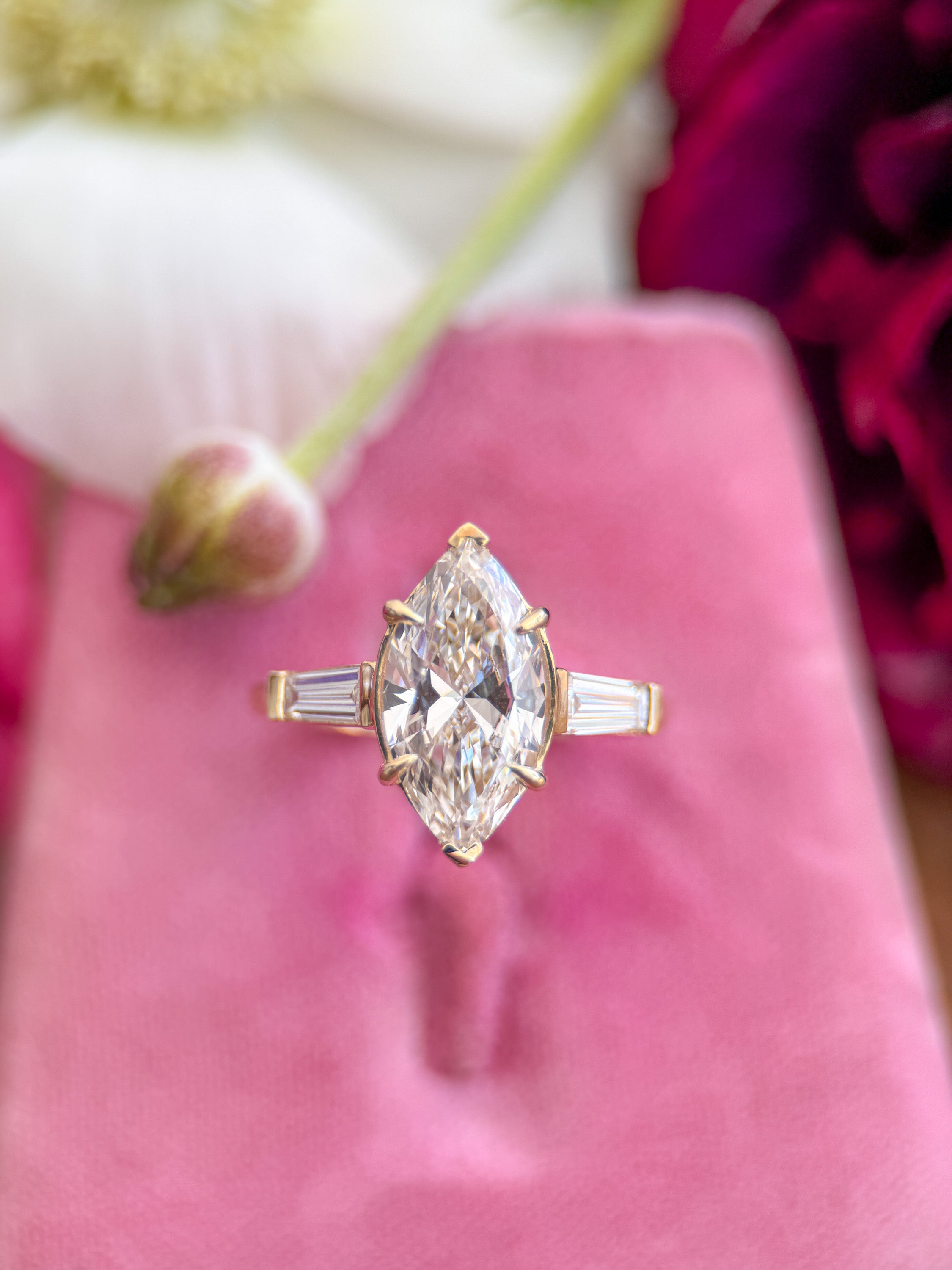 M & Co. Marquise Engagement Ring with Tapered Baguettes
