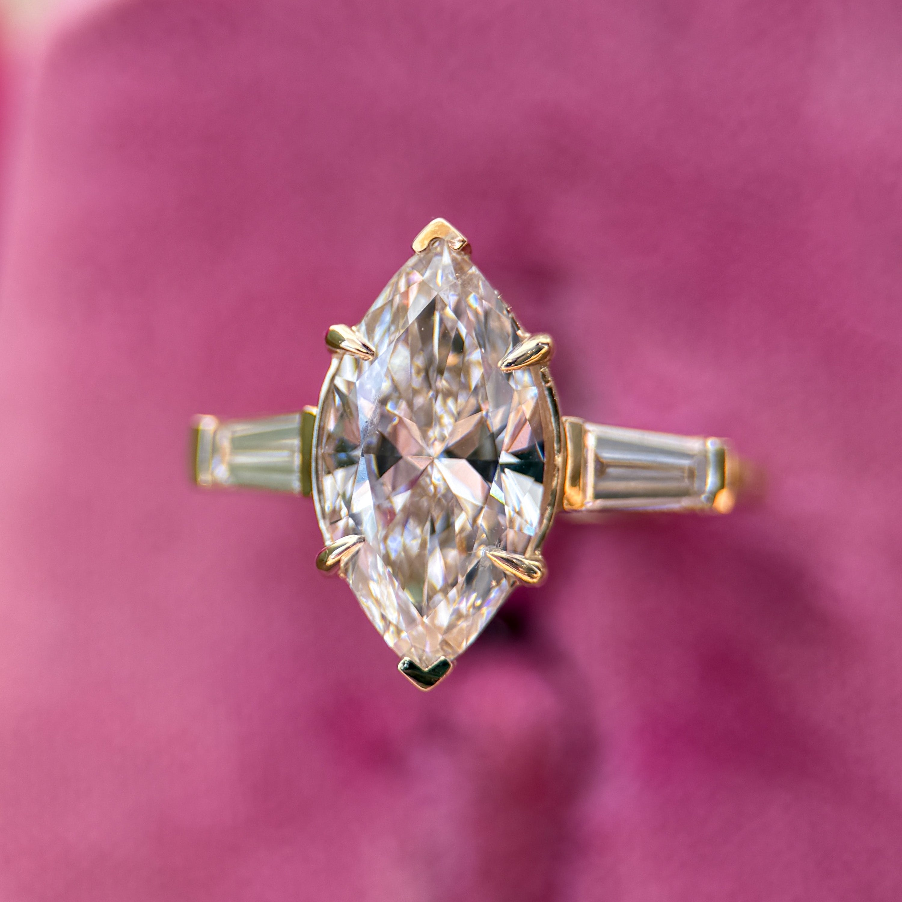 M & Co. Marquise Engagement Ring with Tapered Baguettes