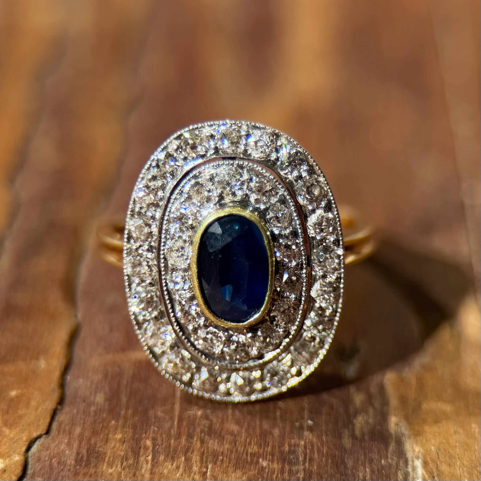 Edwardian Sapphire Ring with Diamond Halo