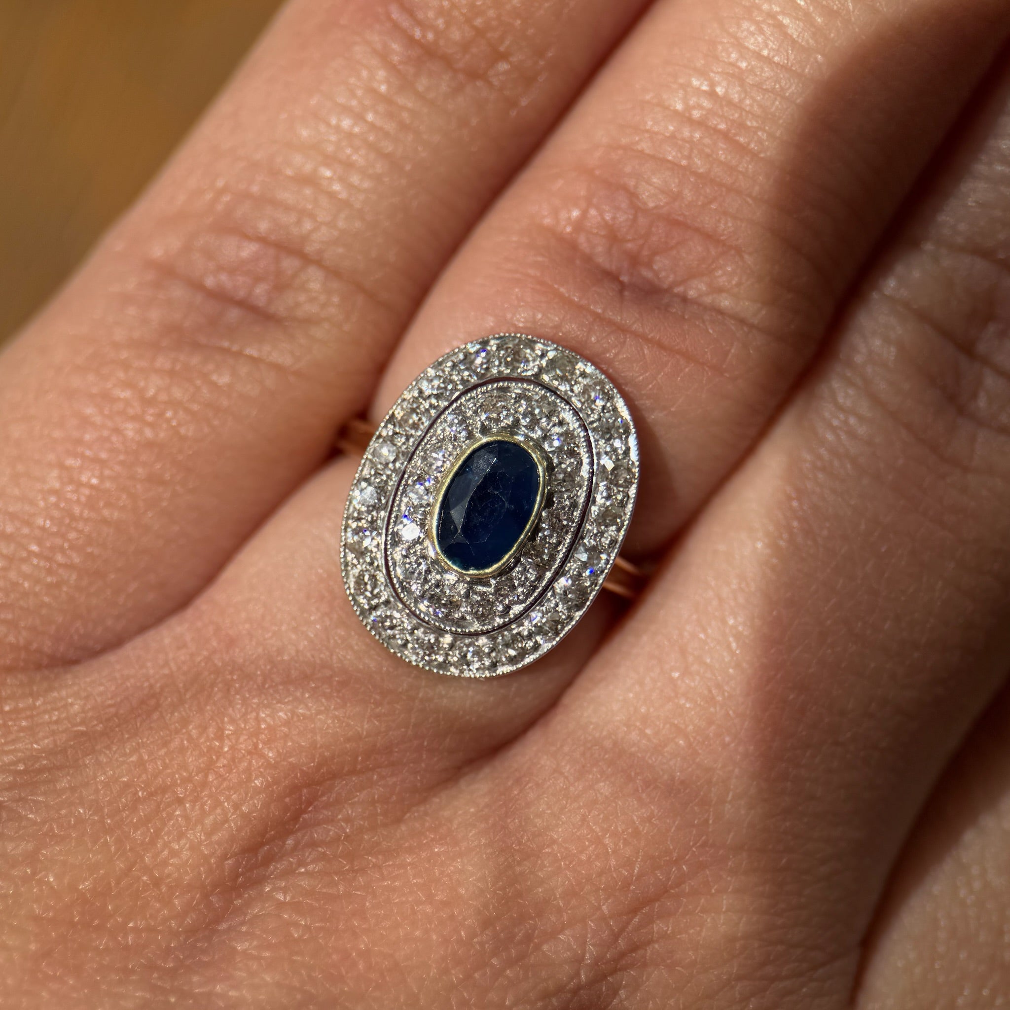 Edwardian Sapphire Ring with Diamond Halo