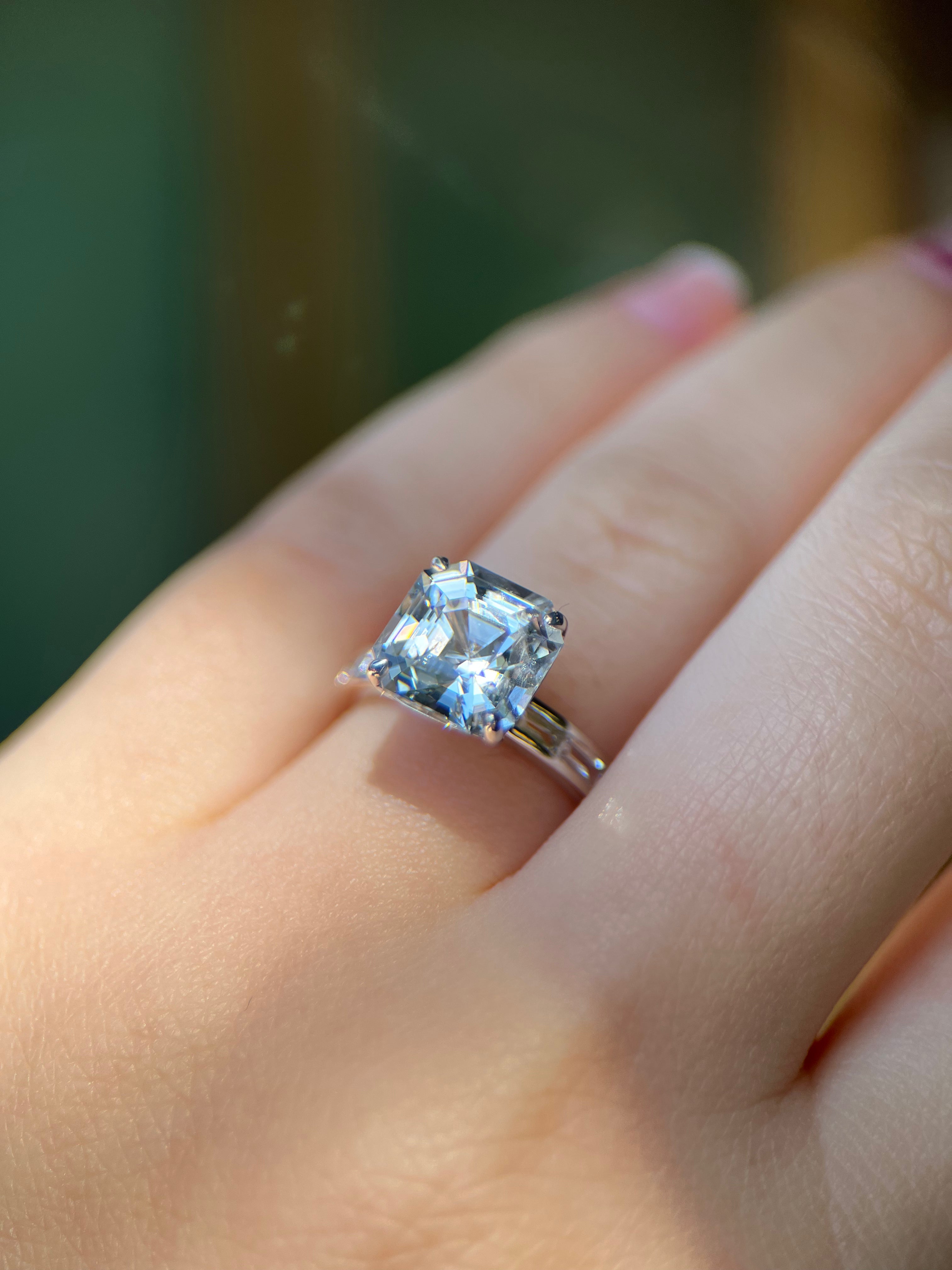 Asscher Cut Colorless Sapphire & Platinum Ring