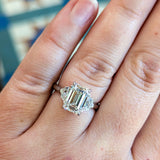M & Co. 3 CT Emerald Cut with Epaulette Accents Three Stone Ring