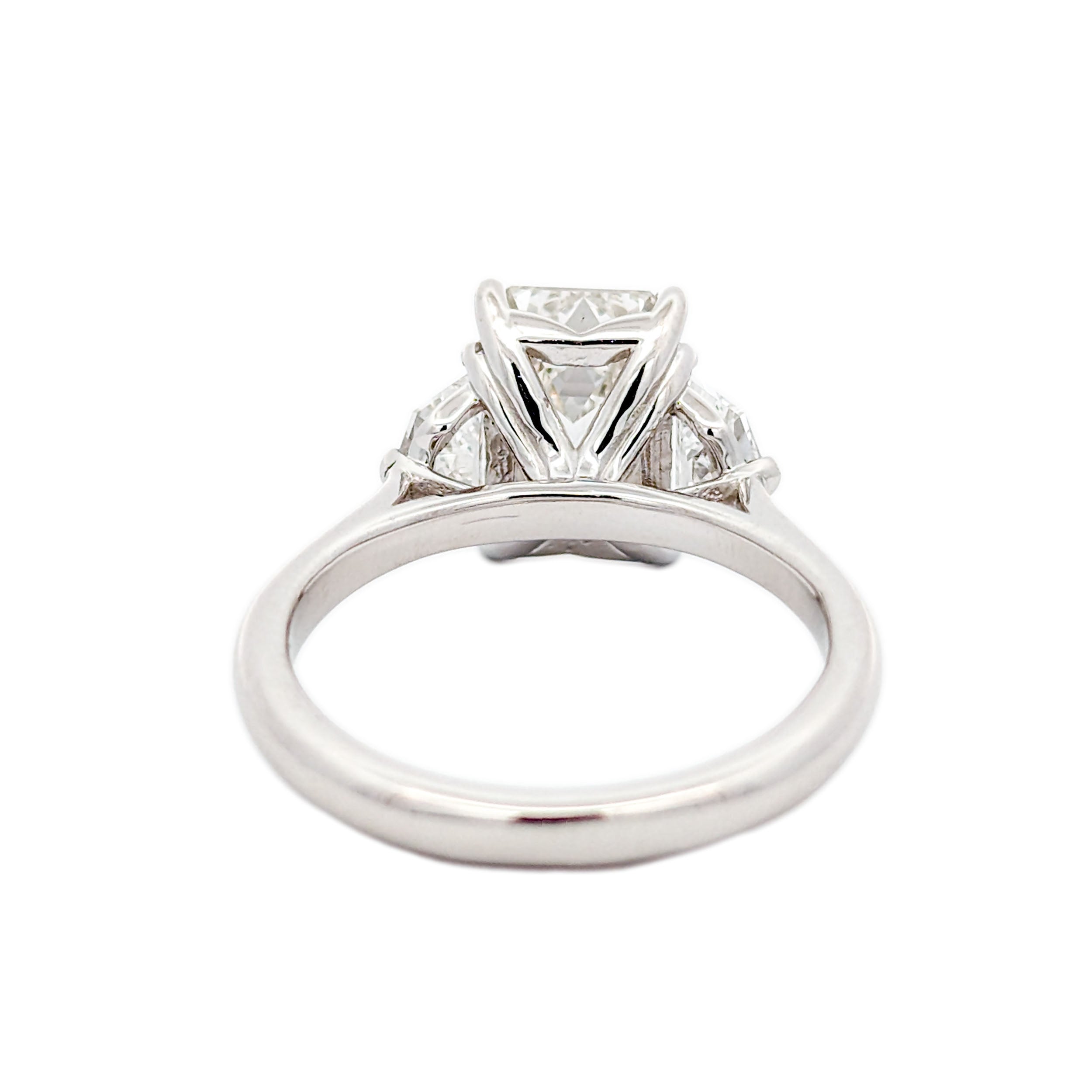 M & Co. 3 CT Emerald Cut with Epaulette Accents Three Stone Ring