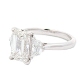 M & Co. 3 CT Emerald Cut with Epaulette Accents Three Stone Ring